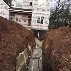 Sewer and Water Repairs - Connecting the new water main