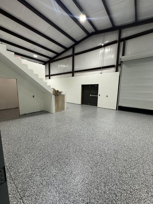 Commercial - Triumph Racing Race Shop. 6500sqft - Triumph Racings new 6500sqft race shop receiving a “Domino” Chip Floor Commercial - Triumph Racing Race Shop. 6500sqft - Triumph Racings new 6500sqft race shop receiving a “Domino” Chip Floor
