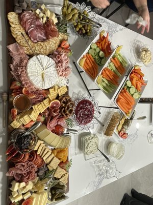 Charcuterie and Heavy Brunch Baby Shower Buffet, Showcasing Some Past Client Favorites! - Planning a special event and want to impress your guests with exquisite food and presentation? Whether it’s a cozy baby shower, an elegant dinner party, or a glamorous high-end gathering, our catering service provides a carefully curated selection of gourmet dishes designed to elevate any occasion.
We offer a wide variety of high-quality food options that cater to a diverse range of tastes and preferences. From beautifully arranged charcuterie boards to decadent hot and cold appetizers, our selections are sure to satisfy your guests and make your event unforgettable.
Charcuterie and Cheese Boards: A Feast for the Eyes and Tastebuds
Our signature charcuterie boards are the perfect way to begin your event with a splash of flavor and style. Featuring an array of premium cured meats, artisan cheeses, fresh fruits, nuts, and gourmet crackers, these boards are designed to cater to a range of palates. Whether you prefer soft, creamy cheeses, sharp aged varieties, or savory meats like prosciutto, salami, and chorizo, our charcuterie options can be tailored to suit your preferences.
In addition to the meats and cheeses, our boards are adorned with complementary garnishes like honeycomb, fruit preserves, fresh berries, olives, and seasonal herbs, creating a vibrant and colorful presentation that’s sure to delight your guests. Each board is artfully arranged, turning a simple snack into a centerpiece for your event.
Fruit and Cheese Pairings: Fresh, Flavorful, and Refreshing
For a lighter, more refreshing option, we offer an exquisite fruit and cheese platter that perfectly balances sweet and savory flavors. Imagine perfectly ripe pears, juicy grapes, crisp apples, and seasonal berries, paired with a selection of cheeses that range from mild to bold. This combination not only tantalizes the taste buds but also adds a fresh burst of color to your event.
Our fruit and cheese platters are designed to be effortlessly elegant, offering a mix of textures and flavors that pair wonderfully with a glass of wine, champagne, or a specialty cocktail. These platters are the ideal choice for baby showers or more casual gatherings where guests can graze and enjoy the variety of flavors as they mingle.
Assorted Sliders: A Bite-Sized Delight
For those who crave a heartier offering, our assortment of gourmet sliders is an absolute hit. From tender pulled pork with to hot honey chicken or juicy beef patties with melted cheese, our sliders offer a delicious and satisfying bite. We also offer vegetarian options, such as baked eggplant parmesan, grilled vegetable sliders, and sliders made with plant-based patties for those who prefer meatless options.
These mini sandwiches are not only perfect for guests who are looking for something easy to eat while socializing, but they’re also designed to be as visually appealing as they are tasty. We use fresh, locally sourced ingredients to create these sliders, ensuring each bite is packed with flavor.
Hot and Cold Appetizers: A Perfect Balance
Cold Appetizers: Elegant canapés, smoked salmon on toasted crostini, cucumber bites with herbed cream cheese, and roasted tomato bruschetta with unique flavor twists are just a few of the cold appetizers we offer. Each bite is crafted to bring a burst of flavor that pairs perfectly with a refreshing cocktail or a glass of champagne.
Hot Appetizers: For those craving something warm and indulgent, our hot appetizers include mini crab cakes, filet mignon bites with garlic butter, chipotle chicken wings, and hot Italian sub sliders with an Italian vinaigrette. These mouthwatering options are perfect for those who want to enjoy something hearty and flavorful while mingling with other guests.
Perfectly Paired with Your Custom Bar
Our catering options are designed to pair effortlessly with your own bar setup, whether you’re serving mimosas at a brunch event or offering a selection of signature cocktails at your evening affair. Our light, refreshing appetizers are perfect for pairing with sparkling wines, and our savory sliders and hearty hot appetizers are ideal for balancing out craft beers or classic cocktails.
If you’re hosting a baby shower, we can also offer a non-alcoholic bar setup featuring fresh juices, flavored waters, and mocktails, so your guests can enjoy refreshing drinks alongside our delicious food offerings.
From the first bite to the last sip, our catering service is committed to providing high-end, thoughtfully crafted dishes that will leave a lasting impression on your guests. Our attention to detail and dedication to quality ensures that your event will be a culinary experience that everyone will remember. Charcuterie and Heavy Brunch Baby Shower Buffet, Showcasing Some Past Client Favorites! - Planning a special event and want to impress your guests with exquisite food and presentation? Whether it’s a cozy baby shower, an elegant dinner party, or a glamorous high-end gathering, our catering service provides a carefully curated selection of gourmet dishes designed to elevate any occasion.
We offer a wide variety of high-quality food options that cater to a diverse range of tastes and preferences. From beautifully arranged charcuterie boards to decadent hot and cold appetizers, our selections are sure to satisfy your guests and make your event unforgettable.
Charcuterie and Cheese Boards: A Feast for the Eyes and Tastebuds
Our signature charcuterie boards are the perfect way to begin your event with a splash of flavor and style. Featuring an array of premium cured meats, artisan cheeses, fresh fruits, nuts, and gourmet crackers, these boards are designed to cater to a range of palates. Whether you prefer soft, creamy cheeses, sharp aged varieties, or savory meats like prosciutto, salami, and chorizo, our charcuterie options can be tailored to suit your preferences.
In addition to the meats and cheeses, our boards are adorned with complementary garnishes like honeycomb, fruit preserves, fresh berries, olives, and seasonal herbs, creating a vibrant and colorful presentation that’s sure to delight your guests. Each board is artfully arranged, turning a simple snack into a centerpiece for your event.
Fruit and Cheese Pairings: Fresh, Flavorful, and Refreshing
For a lighter, more refreshing option, we offer an exquisite fruit and cheese platter that perfectly balances sweet and savory flavors. Imagine perfectly ripe pears, juicy grapes, crisp apples, and seasonal berries, paired with a selection of cheeses that range from mild to bold. This combination not only tantalizes the taste buds but also adds a fresh burst of color to your event.
Our fruit and cheese platters are designed to be effortlessly elegant, offering a mix of textures and flavors that pair wonderfully with a glass of wine, champagne, or a specialty cocktail. These platters are the ideal choice for baby showers or more casual gatherings where guests can graze and enjoy the variety of flavors as they mingle.
Assorted Sliders: A Bite-Sized Delight
For those who crave a heartier offering, our assortment of gourmet sliders is an absolute hit. From tender pulled pork with to hot honey chicken or juicy beef patties with melted cheese, our sliders offer a delicious and satisfying bite. We also offer vegetarian options, such as baked eggplant parmesan, grilled vegetable sliders, and sliders made with plant-based patties for those who prefer meatless options.
These mini sandwiches are not only perfect for guests who are looking for something easy to eat while socializing, but they’re also designed to be as visually appealing as they are tasty. We use fresh, locally sourced ingredients to create these sliders, ensuring each bite is packed with flavor.
Hot and Cold Appetizers: A Perfect Balance
Cold Appetizers: Elegant canapés, smoked salmon on toasted crostini, cucumber bites with herbed cream cheese, and roasted tomato bruschetta with unique flavor twists are just a few of the cold appetizers we offer. Each bite is crafted to bring a burst of flavor that pairs perfectly with a refreshing cocktail or a glass of champagne.
Hot Appetizers: For those craving something warm and indulgent, our hot appetizers include mini crab cakes, filet mignon bites with garlic butter, chipotle chicken wings, and hot Italian sub sliders with an Italian vinaigrette. These mouthwatering options are perfect for those who want to enjoy something hearty and flavorful while mingling with other guests.
Perfectly Paired with Your Custom Bar
Our catering options are designed to pair effortlessly with your own bar setup, whether you’re serving mimosas at a brunch event or offering a selection of signature cocktails at your evening affair. Our light, refreshing appetizers are perfect for pairing with sparkling wines, and our savory sliders and hearty hot appetizers are ideal for balancing out craft beers or classic cocktails.
If you’re hosting a baby shower, we can also offer a non-alcoholic bar setup featuring fresh juices, flavored waters, and mocktails, so your guests can enjoy refreshing drinks alongside our delicious food offerings.
From the first bite to the last sip, our catering service is committed to providing high-end, thoughtfully crafted dishes that will leave a lasting impression on your guests. Our attention to detail and dedication to quality ensures that your event will be a culinary experience that everyone will remember.