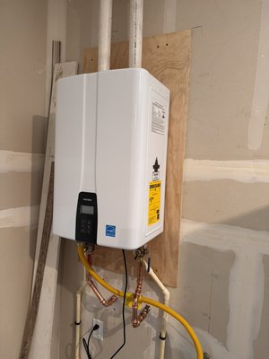 Tankless water heater swap out - Installed new Navien tankless water in heater in place of old A.O. Smith tankless