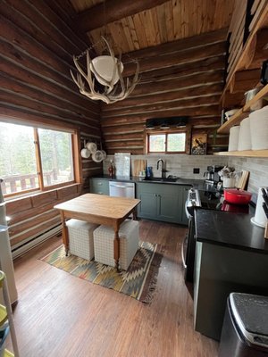 Cabin Remodel - Our Red Feather project showcases Summit Design and Fabrication's remodeling and fabrication expertise. This complete renovation features custom woodworking, a beautifully redesigned bathroom, and a modern kitchen with floating maple shelves and underlighting for a clean, contemporary look. A standout feature is the custom railing, blending rustic and industrial design with maple wood and hand-fabricated metal posts. Every element of the remodel, from the craftsmanship to the design, reflects our commitment to quality and detail. Cabin Remodel - Our Red Feather project showcases Summit Design and Fabrication's remodeling and fabrication expertise. This complete renovation features custom woodworking, a beautifully redesigned bathroom, and a modern kitchen with floating maple shelves and underlighting for a clean, contemporary look. A standout feature is the custom railing, blending rustic and industrial design with maple wood and hand-fabricated metal posts. Every element of the remodel, from the craftsmanship to the design, reflects our commitment to quality and detail.