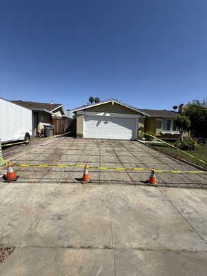 Concrete Driveway 2025 - We completed remove a heavily cracked cement driveway and replaced it a fresh 4” of concrete adding reinforcing rebar to strengthen driveway against cracking and moving Concrete Driveway 2025 - We completed remove a heavily cracked cement driveway and replaced it a fresh 4” of concrete adding reinforcing rebar to strengthen driveway against cracking and moving