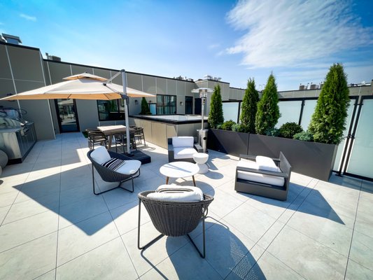 Penthouse Roof Deck - Chicago - This Chicago penthouse was originally naked, we custom designed it and added features to make it more enjoyable. We brought up materials 7 floors up and installed a deck, artificial turf, water feature, plants, and more! Penthouse Roof Deck - Chicago - This Chicago penthouse was originally naked, we custom designed it and added features to make it more enjoyable. We brought up materials 7 floors up and installed a deck, artificial turf, water feature, plants, and more!