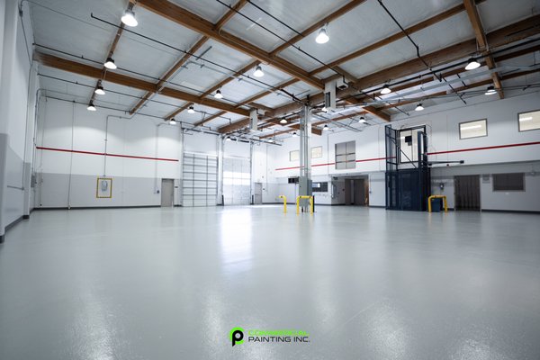 Industrial Warehouse Repaint - Industrial, 28,000+ sq ft warehouse repaint. When we came into this project, multiple wall surfaces were damaged and paint was chipping off. Our team was able to help the client with providing a drywall partner that assisted moving one of the walls back as well as full service repaint. All of the walls were evened out and repaired. In addition, since the ceiling was tall, our team was able to dust off ceiling panels as a complimentary service. Industrial Warehouse Repaint - Industrial, 28,000+ sq ft warehouse repaint. When we came into this project, multiple wall surfaces were damaged and paint was chipping off. Our team was able to help the client with providing a drywall partner that assisted moving one of the walls back as well as full service repaint. All of the walls were evened out and repaired. In addition, since the ceiling was tall, our team was able to dust off ceiling panels as a complimentary service.