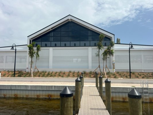 Slip-A-Way Food Truck Park & Marina - Here is a proud install completed for Slip-A-Way Food Truck Park & Marina in April 2025. We enclosed their entire bar and seating area with our double-wall extruded aluminum roll down hurricane shutters. The park wanted a laid-back open concept but still needed security for when the park is closed and this was a great solution; delivering a clean, secure, and storm-ready system built to withstand Florida weather & provide nightly security. Each shutter was custom-measured, fitted, and anchored to protect vendors, customers, and equipment without disrupting the venue’s aesthetic or functionality. The finished setup provides long-term peace of mind and elevated storm preparedness for the entire property. Slip-A-Way Food Truck Park & Marina - Here is a proud install completed for Slip-A-Way Food Truck Park & Marina in April 2025. We enclosed their entire bar and seating area with our double-wall extruded aluminum roll down hurricane shutters. The park wanted a laid-back open concept but still needed security for when the park is closed and this was a great solution; delivering a clean, secure, and storm-ready system built to withstand Florida weather & provide nightly security. Each shutter was custom-measured, fitted, and anchored to protect vendors, customers, and equipment without disrupting the venue’s aesthetic or functionality. The finished setup provides long-term peace of mind and elevated storm preparedness for the entire property.