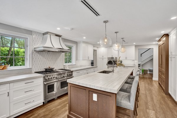 Rustic White Wonder Kitchen Remodel - This kitchen remodel features an effortless combination of rustic tradition and modern splendor. Featuring both natural wood and white shaker style cabinetry, matched with updated stainless-steel appliances, this kitchen will be sure to feel just as cozy as it does luxurious. Rustic White Wonder Kitchen Remodel - This kitchen remodel features an effortless combination of rustic tradition and modern splendor. Featuring both natural wood and white shaker style cabinetry, matched with updated stainless-steel appliances, this kitchen will be sure to feel just as cozy as it does luxurious.