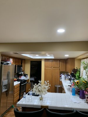 Recessed lighting - This lighting upgrade was done in the kitchen and living room. Florescent fixture were removed. 6 new lights added in living room. Customer was living here for over 15 years. Said she doesn’t know how she went so long  with the existing lighting.