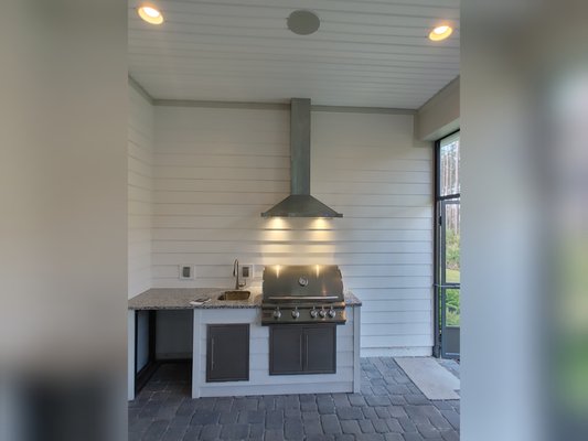 Kitchen range hood installation - Installation of new over the range hood with exhaust ventilation piping. Kitchen range hood installation - Installation of new over the range hood with exhaust ventilation piping.