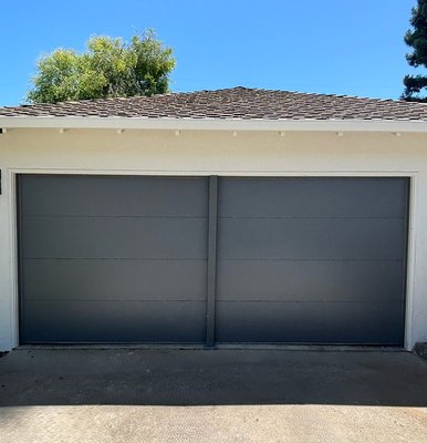 Clopay Garage Door Installation - This project called for a modern curb appeal. Our client was interested in a flush with good insulation and a side mounted opener to free up the ceiling space. We recommended a Clopay Modern Steel door series 4308 in the flush design with a LiftMaster model 98022.
Our client was very satisfied with the results. Clopay Garage Door Installation - This project called for a modern curb appeal. Our client was interested in a flush with good insulation and a side mounted opener to free up the ceiling space. We recommended a Clopay Modern Steel door series 4308 in the flush design with a LiftMaster model 98022.
Our client was very satisfied with the results.