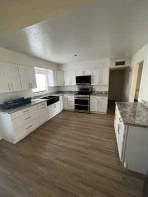Kitchen and floors - We remodeled the kitchen and replaced the flooring in the whole house. Kitchen and floors - We remodeled the kitchen and replaced the flooring in the whole house.