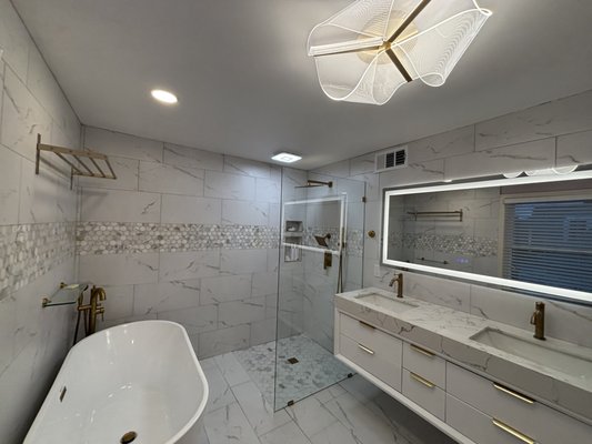 Electrical Remodel - Full-scope electrical work from start to finish.
We guided the lighting layout, installed a proper exhaust fan, and added under-cabinet and mirror lighting for clean, functional illumination. Every detail was designed for safety, usability, and long-term reliability—especially in a high-moisture space like a bathroom.
When the electrical is planned right, the whole remodel feels better. Electrical Remodel - Full-scope electrical work from start to finish.
We guided the lighting layout, installed a proper exhaust fan, and added under-cabinet and mirror lighting for clean, functional illumination. Every detail was designed for safety, usability, and long-term reliability—especially in a high-moisture space like a bathroom.
When the electrical is planned right, the whole remodel feels better.