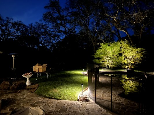 Landscape Lighting Project - We are pleased to share the details of a recent landscape lighting project we completed for a client hosting a family wedding on their property.
Our team designed the lighting layout and assisted the clients in selecting the ideal manufacturer for their needs. Despite the extensive nature of the installation, we utilized our electrical expertise to develop and execute a strategic lighting plan. We are happy to report that the client was thrilled with the final result. Landscape Lighting Project - We are pleased to share the details of a recent landscape lighting project we completed for a client hosting a family wedding on their property.
Our team designed the lighting layout and assisted the clients in selecting the ideal manufacturer for their needs. Despite the extensive nature of the installation, we utilized our electrical expertise to develop and execute a strategic lighting plan. We are happy to report that the client was thrilled with the final result.