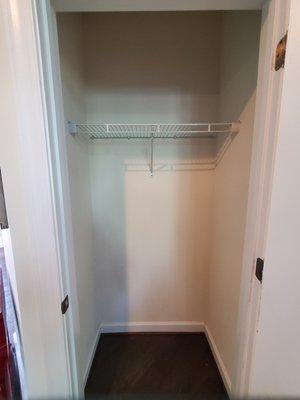 Joanne's House - We installed a Custom Coat Closet and a Master Closet. We used White Melamine with adjustable Rods and Shelves. Full extension Drawers with Stainless steel Bar Pulls.