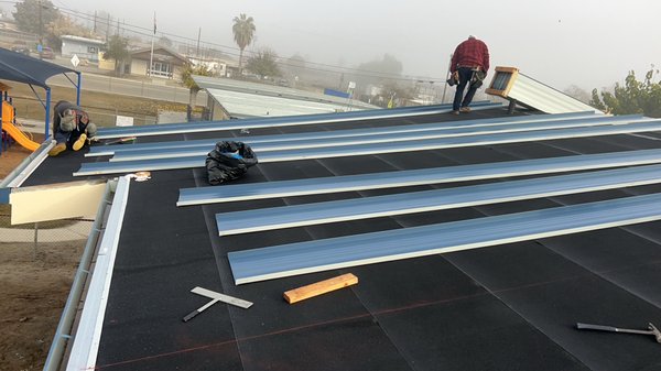 Metal Roof Installation - Quality work done by Jacobo Roofing Inc.