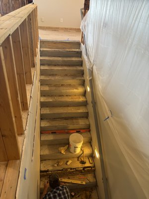Stair way lighting - Using LED tape light we created depth to the rock on the stairs with out losing any functional light.