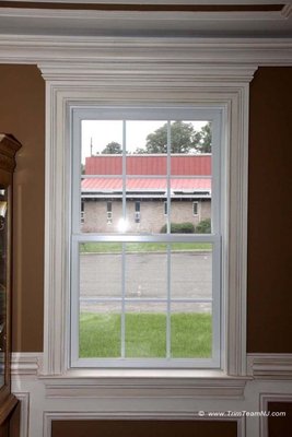 Custom window casing installation with decorative crown molding - Enhance the look of your windows with Custom Window Casing and Decorative Crown Molding! This upgrade adds depth, elegance, and a polished finish to any room. With clean lines and beautifully detailed crown molding, your windows become true architectural features that elevate your entire space. Perfect for adding character to living rooms, bedrooms, and entryways — a small detail that makes a big impact.