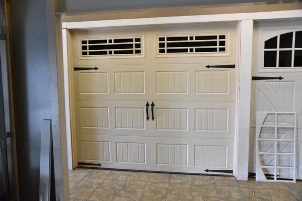 Amarr Short Panel Carriage House Door - Walnut Wood grain option in Non-Insulated most manufactures only offer it in the steel back options. The non-insulated option gives the cost saving option for homeowners who don’t want to spend the extra but still want a wood grain color. This isn’t the only design in their carriage collection they have 4 different options! Amarr Short Panel Carriage House Door - Walnut Wood grain option in Non-Insulated most manufactures only offer it in the steel back options. The non-insulated option gives the cost saving option for homeowners who don’t want to spend the extra but still want a wood grain color. This isn’t the only design in their carriage collection they have 4 different options!