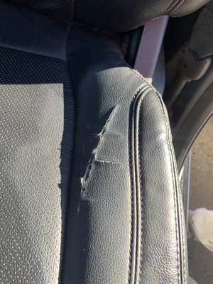 Auto Repair - This Ford Expedition drivers seat needed some love. The side bolster vinyl material was cut and continued to tear upon each use of this vehicle. We restored this seat back to it’s former glory!