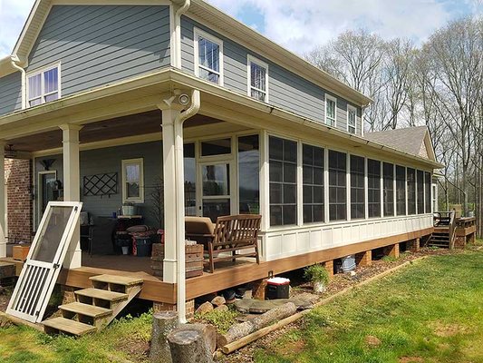 Eze-Breeze Porch - Let the breeze in. Keep the weather out!
Add more livability to your screened porch with Eze-Breeze® Sliding Panels. They’re versatile, attractive, strong, and easy to operate. Because they are custom-made, they make it easy to enclose your existing porch.
The lightweight vinyl-glazed panels can be raised or lowered effortlessly to open up three-quarters of the window area.
The strong vinyl glazing used in Eze-Breeze® Sliding Panels is lighter in weight and more affordable than glass. The tough 10-mil vinyl offers panoramic view, while keeping wind and weather out. Eze-Breeze Porch - Let the breeze in. Keep the weather out!
Add more livability to your screened porch with Eze-Breeze® Sliding Panels. They’re versatile, attractive, strong, and easy to operate. Because they are custom-made, they make it easy to enclose your existing porch.
The lightweight vinyl-glazed panels can be raised or lowered effortlessly to open up three-quarters of the window area.
The strong vinyl glazing used in Eze-Breeze® Sliding Panels is lighter in weight and more affordable than glass. The tough 10-mil vinyl offers panoramic view, while keeping wind and weather out.