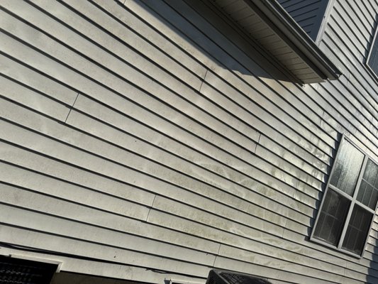 House Cleaning and Transformation - This home had heavy buildup from dirt, algae, mildew, and years of exposure to the elements. The siding had lost its original brightness, and the exterior looked dull and stained.
Using a professional soft washing process, we safely removed the organic growth and restored the home’s appearance without damaging the siding. The difference is clear—the exterior is brighter, cleaner, and looks refreshed.
Regular house washing not only improves curb appeal but also helps protect your home’s exterior by removing contaminants that can shorten the life of your siding.
If your home is showing signs of green algae, black streaks, or built-up dirt, contact Koy Services for a free estimate. We’re proud to help homeowners keep their properties looking their best. House Cleaning and Transformation - This home had heavy buildup from dirt, algae, mildew, and years of exposure to the elements. The siding had lost its original brightness, and the exterior looked dull and stained.
Using a professional soft washing process, we safely removed the organic growth and restored the home’s appearance without damaging the siding. The difference is clear—the exterior is brighter, cleaner, and looks refreshed.
Regular house washing not only improves curb appeal but also helps protect your home’s exterior by removing contaminants that can shorten the life of your siding.
If your home is showing signs of green algae, black streaks, or built-up dirt, contact Koy Services for a free estimate. We’re proud to help homeowners keep their properties looking their best.