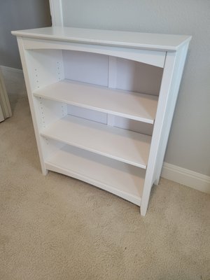 White Bedroom Furniture Set - This white bedroom set was assembled for one of our customers children who loved the color white. This bedroom set included a desk, bookshelf, two small nightstands, bedframe, and a toy chest. They also wanted a white cabinet for the main living room for some extra storage space which matched fantastically with the other white furniture pieces.