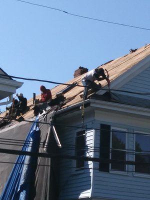 New roof and new gutters. Inside a complete rehab - This roof was done first followed by gutters and then did a rehab of what the homeowner wanted fixed. Duration of project: one day for roof + one day for the gutters, and four weeks to complete the rehab.