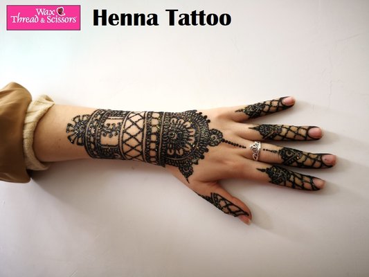 Henna Tattoo - Add a touch of elegance with our beautiful henna tattoos. Whether for a special occasion or just because our intricate designs are crafted to perfection.
