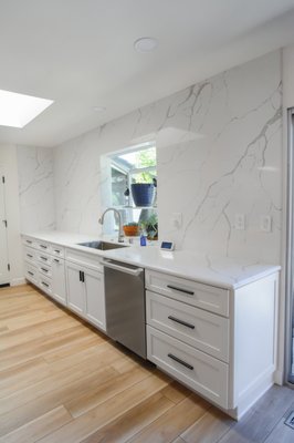 Kitchen Remodel - This remodel consist of removing two load bearing walls , adding a green house window . Removing a florescent light box and a complete new layout.