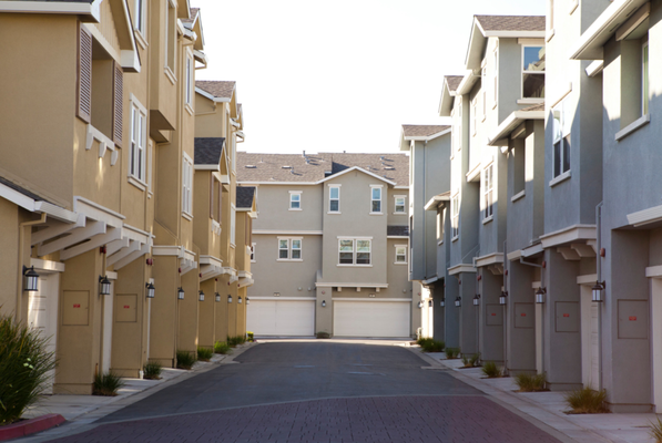 200 Unit HOA Exterior Painting - The paint colors that were chosen for this 200 unit HOA were; Sherwin Williams Pearly White for the trim/fascia, Sherwin Williams Rugged Brown for the fiber cement /hardie board planking, and to complete the color scheme Sherwin Williams Brainstorm Bronze for the metal awnings and brackets Nicole Stites Photography