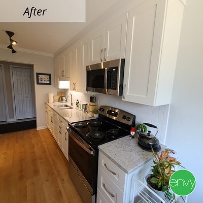 PALATINE, IL GALLEY KITCHEN REMODEL - Palatine, IL Kitchen Remodel completed in 2021. This kitchen has not been updated for a while. The painted cabinets were difficult to keep clean, and the backsplash could use a refresh. The homeowner wanted to remove the soffits and extend the cabinets all the way to the ceiling.