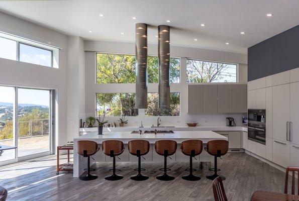 Award Winning Home Remodel 2019 - An open floor concept was created to take advantage of the views that can be enjoyed from both the kitchen & living room areas. Interior finishes were upgraded, including those of the master bathroom and master bedroom. Extra square footage was added to the family room and kitchen to meet with the family's essential criteria of high ceilings and a lot of natural light. Award Winning Home Remodel 2019 - An open floor concept was created to take advantage of the views that can be enjoyed from both the kitchen & living room areas. Interior finishes were upgraded, including those of the master bathroom and master bedroom. Extra square footage was added to the family room and kitchen to meet with the family's essential criteria of high ceilings and a lot of natural light.