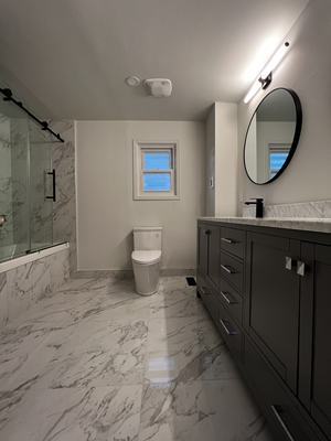 Gray and White Master Bathroom - In this master bathroom, luxe details like heated floors and a walk-in shower are ready to pamper occupants. Gray and White Master Bathroom - In this master bathroom, luxe details like heated floors and a walk-in shower are ready to pamper occupants.