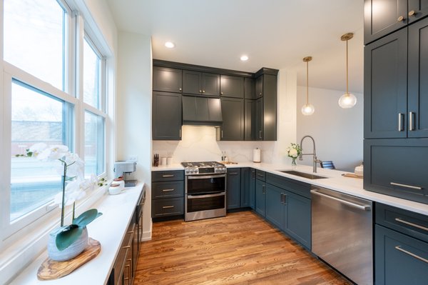 Townhouse Remodel in Chicago Edgewater Neighborhood - Discover a beautifully remodeled townhome in Chicago's sought-after Edgewater neighborhood, blending modern sophistication with timeless charm. This stunning transformation features Dark Navy Blue kitchen cabinets, offering a sleek, bold statement that enhances the space's versatility and durability. Whether your style leans contemporary or classic, these cabinets provide an elegant touch that elevates the heart of your home.
The remodel extends beyond the kitchen, showcasing a luxurious master bathroom designed for relaxation and functionality. A freestanding bathtub takes center stage, complemented by a walk-in shower and double sinks, creating a spa-like retreat perfect for unwinding after a long day.
New flooring throughout the home adds warmth and cohesiveness, while updated doors and fresh painting breathe new life into every room. Thoughtfully designed to balance style and practicality, this remodel harmonizes modern updates with timeless finishes to create a home that is both inviting and functional.
Located in the vibrant Edgewater neighborhood, this townhome offers a perfect blend of urban living and residential charm. Experience the transformation and elevate your lifestyle with a beautifully remodeled space tailored to meet your needs. Don’t miss the opportunity to make this elegant townhome your new sanctuary! Townhouse Remodel in Chicago Edgewater Neighborhood - Discover a beautifully remodeled townhome in Chicago's sought-after Edgewater neighborhood, blending modern sophistication with timeless charm. This stunning transformation features Dark Navy Blue kitchen cabinets, offering a sleek, bold statement that enhances the space's versatility and durability. Whether your style leans contemporary or classic, these cabinets provide an elegant touch that elevates the heart of your home.
The remodel extends beyond the kitchen, showcasing a luxurious master bathroom designed for relaxation and functionality. A freestanding bathtub takes center stage, complemented by a walk-in shower and double sinks, creating a spa-like retreat perfect for unwinding after a long day.
New flooring throughout the home adds warmth and cohesiveness, while updated doors and fresh painting breathe new life into every room. Thoughtfully designed to balance style and practicality, this remodel harmonizes modern updates with timeless finishes to create a home that is both inviting and functional.
Located in the vibrant Edgewater neighborhood, this townhome offers a perfect blend of urban living and residential charm. Experience the transformation and elevate your lifestyle with a beautifully remodeled space tailored to meet your needs. Don’t miss the opportunity to make this elegant townhome your new sanctuary!