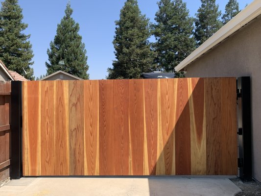 Hybrid Material Gate Systems - A curated collection of custom metal and wood gate systems designed to balance structural strength with the warmth of natural materials. Each piece is fabricated to specification, integrating architectural proportions, refined detailing, and durable finishes to complement modern and traditional residences.