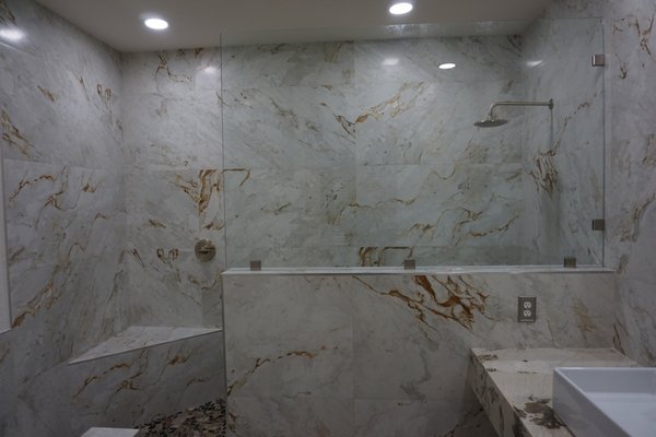 WHITE AND RUST BATHROOM REMODEL - Gutted bathroom extended the shower to the right wall and installed a beautiful white and rust porcelain. Installed a very nice granite floating vanity with a light up mirror WHITE AND RUST BATHROOM REMODEL - Gutted bathroom extended the shower to the right wall and installed a beautiful white and rust porcelain. Installed a very nice granite floating vanity with a light up mirror