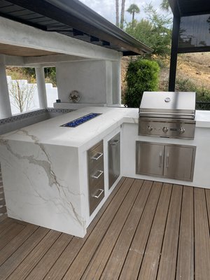 Outdoor kitchen  - What was once an unused backyard is now a beautiful outdoor kitchen where family and friends can gather, cook, relax, and create memories for years to come. Outdoor kitchen  - What was once an unused backyard is now a beautiful outdoor kitchen where family and friends can gather, cook, relax, and create memories for years to come.