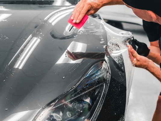 Paint Protection Film (PPF) - Your car's paint is constantly under attack from elements on the road. From rocks and debris to scratches and chemical stains, preserving its pristine appearance can feel like a never-ending battle. The solution?
Paint Protection Film (PPF), and at Precision Detailing Pro, we specialize in providing the ultimate protection for your vehicle. Discover why PPF is a worthy investment and how our expert application process ensures the best results.
Why Your Car Can Benefit from PPF: Shielding Your Paint from Harm
No matter how careful you are, the road threatens your car's paintwork. PPF offers a powerful defense against these potential damages. Here's why your car can significantly benefit from PPF:
1. Stone Chips and Road Debris: PPF is a protective shield that helps absorb impact from rocks, gravel, and other road debris, preventing chips and scratches from marring your car's surface.
2. UV Damage and Fading: PPF provides UV resistance, shielding your car's paint from the harmful effects of the sun's rays, including fading and discoloration.
3. Chemical Stains: The road exposes your car to various corrosive substances such as bird droppings, bug splatters, and acid rain. PPF forms a barrier that resists these chemicals from etching into the paint, ensuring your car stays looking pristine.
4. Wear and Tear: PPF acts as a sacrificial layer, absorbing minor abrasions and preventing them from reaching the paint surface. This helps preserve the finish of your car and maintain its resale value.
Call us now to schedule an appointment for a PPF application Paint Protection Film (PPF) - Your car's paint is constantly under attack from elements on the road. From rocks and debris to scratches and chemical stains, preserving its pristine appearance can feel like a never-ending battle. The solution?
Paint Protection Film (PPF), and at Precision Detailing Pro, we specialize in providing the ultimate protection for your vehicle. Discover why PPF is a worthy investment and how our expert application process ensures the best results.
Why Your Car Can Benefit from PPF: Shielding Your Paint from Harm
No matter how careful you are, the road threatens your car's paintwork. PPF offers a powerful defense against these potential damages. Here's why your car can significantly benefit from PPF:
1. Stone Chips and Road Debris: PPF is a protective shield that helps absorb impact from rocks, gravel, and other road debris, preventing chips and scratches from marring your car's surface.
2. UV Damage and Fading: PPF provides UV resistance, shielding your car's paint from the harmful effects of the sun's rays, including fading and discoloration.
3. Chemical Stains: The road exposes your car to various corrosive substances such as bird droppings, bug splatters, and acid rain. PPF forms a barrier that resists these chemicals from etching into the paint, ensuring your car stays looking pristine.
4. Wear and Tear: PPF acts as a sacrificial layer, absorbing minor abrasions and preventing them from reaching the paint surface. This helps preserve the finish of your car and maintain its resale value.
Call us now to schedule an appointment for a PPF application