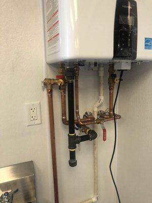 tankless water heather repair - costumer called to get their tankless water heather valve repair, also costumer has old garbage disposal they want to replaced, our tech sean was able to done thet the same day tankless water heather repair - costumer called to get their tankless water heather valve repair, also costumer has old garbage disposal they want to replaced, our tech sean was able to done thet the same day