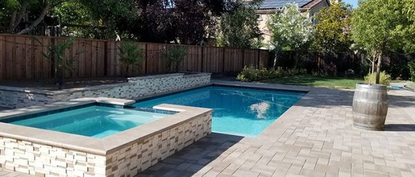 Geometric Pools - Geometric pools are ideal for swimming laps, water polo and pool sports due to their straight edges and sharp lines and are obviously complimentary to many homes existing architecture offering a slick modern look to your backyard. Our pool designs can also offer a more formal and contemporary feel to compliment the surrounding environment and style of your home. When it comes to in-ground pool design and choosing a shape, sometimes simple is the best solution.
At Aqua Dream Pools we can design and build your perfect geometric swimming pool to compliment and merge into the surrounding landscaping, or even provide a professional and custom landscaping job too. We can transform your backyard into your own private hideaway, or natural oasis where you can swim, sunbathe, relax and truly appreciate time together with friends and family. Geometric Pools - Geometric pools are ideal for swimming laps, water polo and pool sports due to their straight edges and sharp lines and are obviously complimentary to many homes existing architecture offering a slick modern look to your backyard. Our pool designs can also offer a more formal and contemporary feel to compliment the surrounding environment and style of your home. When it comes to in-ground pool design and choosing a shape, sometimes simple is the best solution.
At Aqua Dream Pools we can design and build your perfect geometric swimming pool to compliment and merge into the surrounding landscaping, or even provide a professional and custom landscaping job too. We can transform your backyard into your own private hideaway, or natural oasis where you can swim, sunbathe, relax and truly appreciate time together with friends and family.