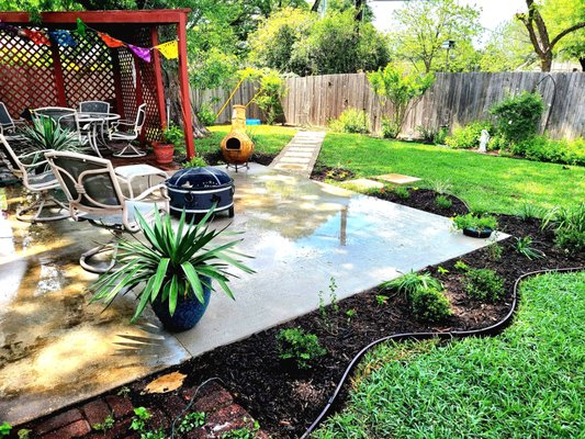 Castle Hills Backyard Project - Client was unhappy with the current curb appeal of her new concrete patio. We suggested and installed new surrounding garden beds to give the patio a finished look. Complete with edging and new mulch she was very happy with the finished product. We also incorporated steps to the yard and a concrete stepping stone walkway with rock and low lying edging to her back gate per her request! Castle Hills Backyard Project - Client was unhappy with the current curb appeal of her new concrete patio. We suggested and installed new surrounding garden beds to give the patio a finished look. Complete with edging and new mulch she was very happy with the finished product. We also incorporated steps to the yard and a concrete stepping stone walkway with rock and low lying edging to her back gate per her request!