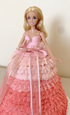 Barbie Cake - Cake complete with with Barbie Doll to celebrate the premiere of the Barbie Movie. Barbie Cake - Cake complete with with Barbie Doll to celebrate the premiere of the Barbie Movie.