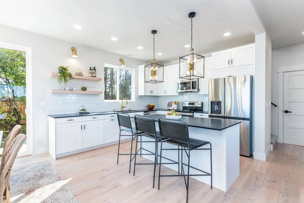 Beautiful Bellmont Frameless White Shaker Kitchen - In this design, we’ve meticulously blended the purity and brightness of white with the sleek, functional design of frameless cabinets to create an atmosphere that is both inviting and inspiring. The Bellmont Frameless White Shaker Kitchen is designed for those who appreciate the beauty in simplicity, where every line, texture, and detail is thoughtfully curated to create a seamless blend of form and function.
This kitchen is more than just a place to cook—it’s a space where design and utility coexist harmoniously, making everyday tasks a pleasure. The Beautiful Bellmont Frameless White Shaker Kitchen is crafted to be the backdrop of your home’s best moments, whether you’re hosting a lively gathering or enjoying a quiet morning coffee. It’s where modern design meets the warmth of home, creating a kitchen that’s as welcoming as it is stunning.
Step into a world where every detail is designed with you in mind, from the whisper-quiet cabinet doors to the elegant, easy-to-clean surfaces. Our Beautiful Bellmont Frameless White Shaker Kitchen is not just about creating a beautiful space; it’s about crafting an experience that elevates your daily life. Visit our portfolio to see how this kitchen can transform the heart of your home into a place where beauty meets functionality, and where your kitchen dreams become reality. Beautiful Bellmont Frameless White Shaker Kitchen - In this design, we’ve meticulously blended the purity and brightness of white with the sleek, functional design of frameless cabinets to create an atmosphere that is both inviting and inspiring. The Bellmont Frameless White Shaker Kitchen is designed for those who appreciate the beauty in simplicity, where every line, texture, and detail is thoughtfully curated to create a seamless blend of form and function.
This kitchen is more than just a place to cook—it’s a space where design and utility coexist harmoniously, making everyday tasks a pleasure. The Beautiful Bellmont Frameless White Shaker Kitchen is crafted to be the backdrop of your home’s best moments, whether you’re hosting a lively gathering or enjoying a quiet morning coffee. It’s where modern design meets the warmth of home, creating a kitchen that’s as welcoming as it is stunning.
Step into a world where every detail is designed with you in mind, from the whisper-quiet cabinet doors to the elegant, easy-to-clean surfaces. Our Beautiful Bellmont Frameless White Shaker Kitchen is not just about creating a beautiful space; it’s about crafting an experience that elevates your daily life. Visit our portfolio to see how this kitchen can transform the heart of your home into a place where beauty meets functionality, and where your kitchen dreams become reality.