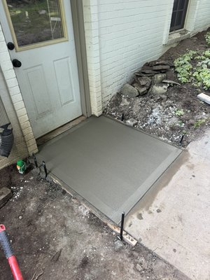 Waterproofing and concrete install - Concrete slab had a negative pitch and was let water in the structure. We tore old slab and exposed parts of the footing and installed waterproofing material once prepped we formed and poured a new slab with a positive pitch away from structure to keep all water out of structure. Customer was very happy.