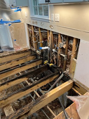 Kitchen Leak Repair - This customer had a leak in their kitchen that required an entire remodel. We had to replace the subfloors and joists, and new PVC pipe in the wall. The kitchen was updated with new countertops, cabinets and flooring. Kitchen Leak Repair - This customer had a leak in their kitchen that required an entire remodel. We had to replace the subfloors and joists, and new PVC pipe in the wall. The kitchen was updated with new countertops, cabinets and flooring.