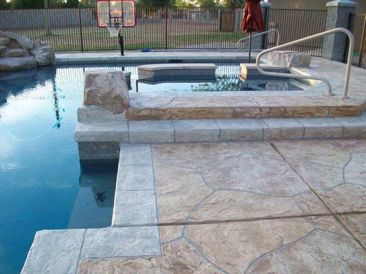 Stamped Concrete - Ultimate Concrete Coatings offers a huge range of stamped concrete colors, patterns and textures and we specialize in custom designing solutions for each, individual customer’s needs and lifestyle. We are committed to delivering flooring that will seamlessly compliment your home and landscaping design and support the activities that are going to play out there for years to come. Stamped Concrete - Ultimate Concrete Coatings offers a huge range of stamped concrete colors, patterns and textures and we specialize in custom designing solutions for each, individual customer’s needs and lifestyle. We are committed to delivering flooring that will seamlessly compliment your home and landscaping design and support the activities that are going to play out there for years to come.