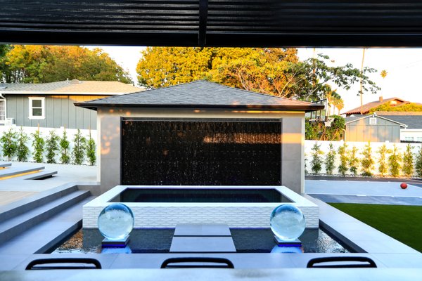 Californication - Californication by Pool Logic. Complete backyard design including custom spa, water features, fire pit, lounge area, patio cover, and outdoor bar & kitchen. Californication - Californication by Pool Logic. Complete backyard design including custom spa, water features, fire pit, lounge area, patio cover, and outdoor bar & kitchen.