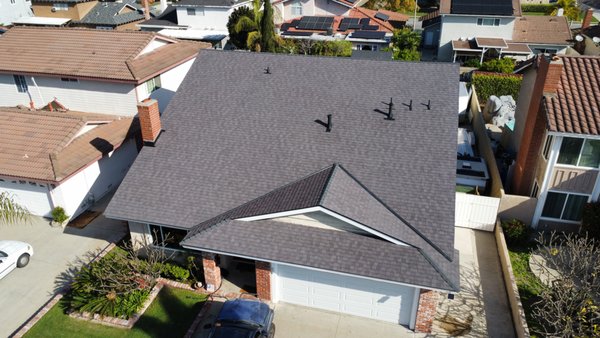 Cypress CA - New Asphalt Shingle Roof System - "Moire Black" CertainTeed Landmark Solaris Cool Roof installed in Cypress, CA—Title 24 & 31 compliant for energy efficiency. Built with Roof Runner protection and O’Hagin dormers for superior ventilation and lasting curb appeal.