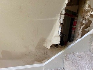 Mold discovered during rehab - A mom with children susceptible to asthma and mold found a leaking pipe and mold in her stairwell and garage areas. We were able to help her get insurance coverage for the dryout and cleaning to help her home be healthy again. Mold discovered during rehab - A mom with children susceptible to asthma and mold found a leaking pipe and mold in her stairwell and garage areas. We were able to help her get insurance coverage for the dryout and cleaning to help her home be healthy again.
