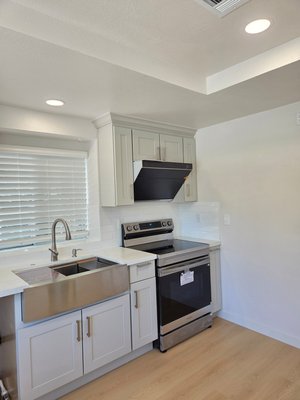 Kitchen remodeling 2026 May - This outdated kitchen was completely transformed into a bright, stylish, and functional modern space. The renovation features elegant light-gray shaker cabinets, quartz countertops, a farmhouse-style stainless-steel sink, new appliances, a clean subway-tile backsplash, recessed lighting, and updated flooring. The new layout maximizes the compact space while creating a fresh, open, and sophisticated look.
From dated and cluttered to clean, modern, and inviting — a complete transformation that gives this kitchen a whole new life. Kitchen remodeling 2026 May - This outdated kitchen was completely transformed into a bright, stylish, and functional modern space. The renovation features elegant light-gray shaker cabinets, quartz countertops, a farmhouse-style stainless-steel sink, new appliances, a clean subway-tile backsplash, recessed lighting, and updated flooring. The new layout maximizes the compact space while creating a fresh, open, and sophisticated look.
From dated and cluttered to clean, modern, and inviting — a complete transformation that gives this kitchen a whole new life.