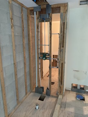 Bathroom remodel roughly 8 months ago. Relocation of shower and then we changed a single bowl vanity into a double bowl vanity. - Bathroom was about 50 year old and out dated. So we came in removed as much old copper piping we could before installing new shower valves and roughed in new lines for double bowl vanity.